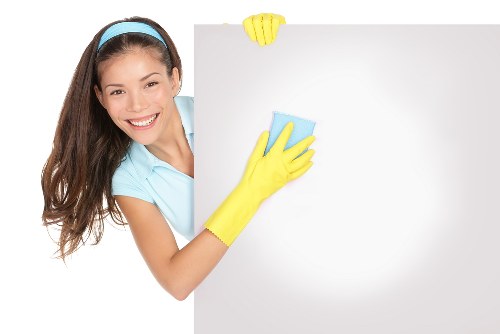 Deep upholstery cleaning removing stains from a fabric sofa
