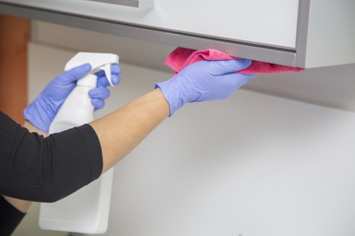 Carpet cleaning staff following hygiene and safety standards